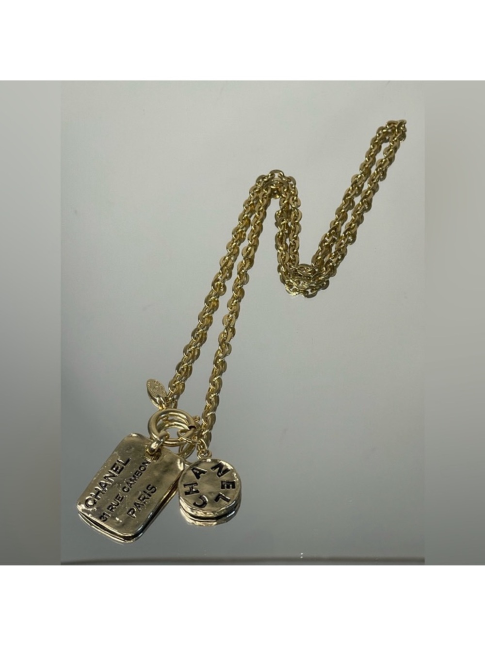 CHANEL Cambon Plate Logo Gold Tone Necklace